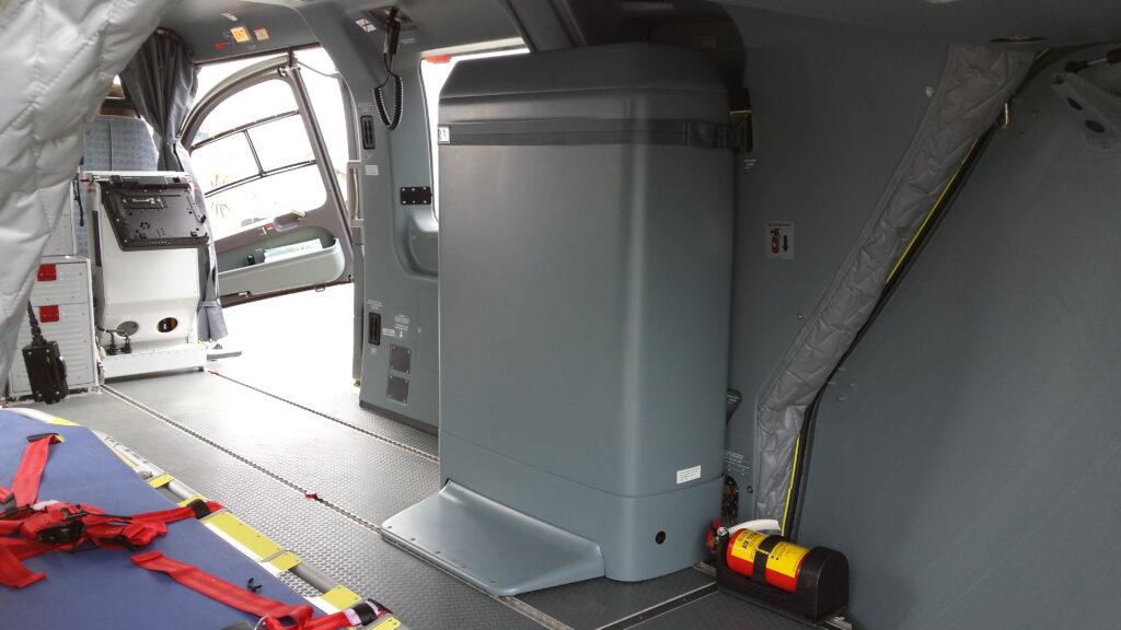 BAM H145 Auxiliary Fuel Tank installed on RH aft cabin seat rails in an air ambulance interior